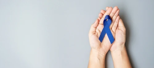 March,Colorectal,Cancer,Awareness,Month,,Man,Holding,Dark,Blue,Ribbon