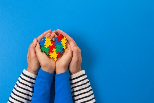 World,Autism,Awareness,Day,Concept.,Adult,And,Child,Hands,Holding